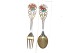 Christmas spoon 
/ fork 1925 A. 
Michelsen
 Poinsettia
 Design: Ellen 
Michelsen
 Unopened ...