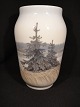 Vase with fir 
trees and 
træstuppe out 
to the inlet
 . Royal 
Copenhafen RC 
No. 2273 - 
1217, ...