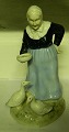 Antique 
Porcelain 
Figurine from 
German/Italy, 
old lady with 
geese. Measures 
19cm and is in 
...