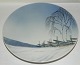 Royal 
Copenhagen 
plate in 
porcelain with 
decorations of 
winter 
landscape. Made 
between ...