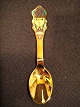 Christmas spoon 
1982 by A. 
Michelsen.
  Queen of 
Sheba.
Designed by. 
Kamma Svensson.
  Gold ...