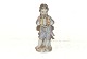 Meissen 
figurine, Man 
with a garland.
Decoration 
number 6-107? 
(6 or 8)
Measures 12.5 
...
