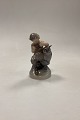 Royal 
Copenhagen 
Figurine Faun 
with Owl No. 
2107. Designed 
by Chr. Thomsen 
in 1920. 
Measures ...
