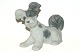 Lladro Figurine 
Dog
Height 14.5 
cm.
Længd 17 cm.
Perfect 
condition.