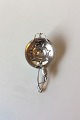 Georg Jensen 
Blossom 
Sterling Silver 
Tea strainer No 
8. Measures 14 
cm / 5 33/64 
in. and is in 
...
