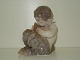 Royal 
Copenhagen Faun 
Figurine, 
decoration 
number 1736, 
factory first 
Perfect 
condition.