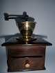 Coffee grinder 
with brass 
funnel, Denmark 
approx. 1880.
21cm. high and 
16cm. wide.