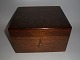 Humidor in 
Mahogany by 
Dunhill, 
England approx. 
1880.
25cm. long, 21 
cm. wide and 
15cm. high.