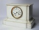 White marble clock, France app. 1900. 21 cm. x 30.5 cm.  In good condition, some wear.