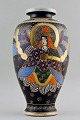 Large Japanese 
Satsuma 
earthenware 
vase. Decorated 
with a man and 
a woman in 
profile. In 
perfect ...
