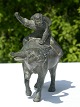 Bronze 
figurine. Boy 
on bull.