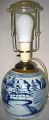 Chinese bojan 
as a lamp, 19th 
century. Blue 
decorated 
stoneware with 
a junk at sea 
between ...