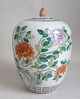Chinese lid 
jar, porcelain, 
20th century. 
Polycrom 
decoration with 
birds and 
flowers. 
Stamped at ...