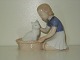 Bing & Grondahl 
figure, girl 
with white 
kitten in 
basket.
Deck # 2249
Length 11.1 cm 
...