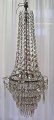 Prisme 
chandelier, 
ca.1900. H: 85 
cm. Dia: 35 cm. 
A total of 497 
prisms. With 3 
electric bulbs.