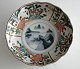 Imari dish, 
Japan, 19th 
century. 
Polychrome 
decoration and 
gilding. With 
waved edge. At 
the ...