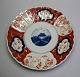 Imari plate, 
Japan, 19th 
century. 
Polychrome 
decoration. 
Lobed edge. Dia 
.: 22 cm.