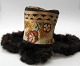 Hat from 
Mongolia, 
19-20. century. 
Embroidered and 
leather.