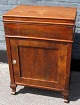 Mahogany 
washstand, 19th 
century. Chr. 
8. With door 
and hinged lid. 
BH .: 90 cm. B 
.: 63.5 cm. ...