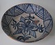 Antique dish, 
18th century. 
Grey 
slip-decorated 
red clay with 
bluish 
geometric 
decorations. 
Dia ...