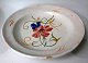 Large French 
faience dish, 
18oo-century 
beginning. 
Light slip with 
polychrome 
floral 
decoration. ...