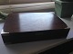 Hans Hansen 
Sterling Silver 
and Rosewood 
box. Measures 
4,7. L. 22,5. 
B. 14,8 cm and 
is in good ...