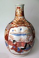 Large Japanese 
imari vase, 
19th century. 
Signed. 
Gourd-shaped. 
Beautiful 
polychrome 
decoration ...