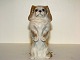 Royal 
Copenhagen 
figurine, 
seated 
pekingese.
The factory 
mark tells, 
that this was 
produced ...
