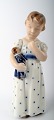 Royal 
Copenhagen 
figurine no. 
3539. Girl with 
Doll. 
Height 15 cm. 
1st. factory 
quality.. ...