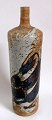 Walther, Conny 
(1931 -) 
Denmark: Vase. 
Brownish 
stoneware with 
glaze in blue, 
white and 
brown. ...