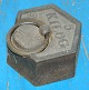 Six sided 5 kg 
weight with 
handles of 
iron. Can also 
be used as a 
doorstop. Two 
on stock.