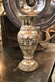 Vase in old 
mercery silver 
with 
decorations on 
the side. 
Height: 24.5