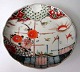 Imaria bowl, 
Japan, 19th 
century. 
Polychrome 
decoration with 
cranes, sun and 
crysantenum, 
Lobed. ...