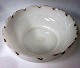Large opaline 
glass bowl, 
19th century. 
Wavy edge and 
gilding. H .: 
10 cm. Dia .: 
26.4 cm. ...