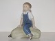 Royal 
Copenhagen 
Figurine, boy 
on gourd.
Decoration 
number 4539.
Factory first.
Length ...