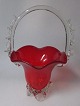 Venetian glass 
vase in the 
shape of a 
basket, 20th 
century. Clear 
and red glass. 
H .: 28 cm.