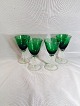 Holmegaard.
White wine 
glass.
Green 
glaskumme with 
Flowers erect. 
standing on 
twisted ...