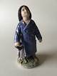 Royal 
Copenhagen 
Figurine Boy 
with Umbrella 
No 3556. 
Measures 18,5cm 
and is in good 
condition.