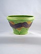 Høj keramikskål 
af Herman A. 
Kähler. Skålen 
er i pæn stand. 
Den har tre 
minimale nøk i 
glasuren. ...