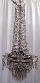 Large crystal 
chandelier, 
19th century. 
Denmark. With 
three lights. 
Hung with 17 
prism chains, 
...