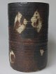 Danish artist 
(20th cent.): 
Stoneware vase. 
Signed: Tulle. 
1977. Stoneware 
with glaze in 
brown ...