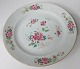 Chinese famille 
rose plate, c. 
1780 - 1800. 
Polykrom 
decoration with 
flowers. 
Unsigned. With 
...