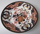 English 
porcelain 
plate, 19th 
century. 
Polychrome 
decoration with 
gilding. Dia .: 
20.5 cm. ...