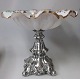 Great 
centerpiece in 
silver and 
crystal, c. 
1890 feet in 
rococo pattern 
in silver, 
filled. Large 
...