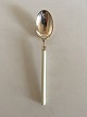Hans Hansen 
Amalie Silver 
Dessert Spoon 
with White 
Handle. 
Measures 17,5cm 
(6 57/64").