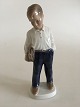 Lyngby 
Porcelain 
Figurine of a 
school Boy 
19cm. In 
perfect 
condition