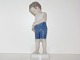 Bing & Grondahl 
figurine, boy 
looking in his 
pocket.
The factory 
mark shows, 
that this was 
...