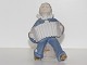 Royal 
Copenhagen 
Figurine, boy 
with accordion.
The factory 
mark tells, 
that this was 
produced ...