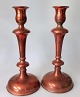 Pair of antique 
copper 
candlesticks, 
Denmark, 19th 
century. Round 
filled foot and 
profiled ...