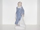 Royal 
Copenhagen 
figurine, boy 
in pyjamas with 
pillows.
The factory 
mark tells, 
that this was 
...